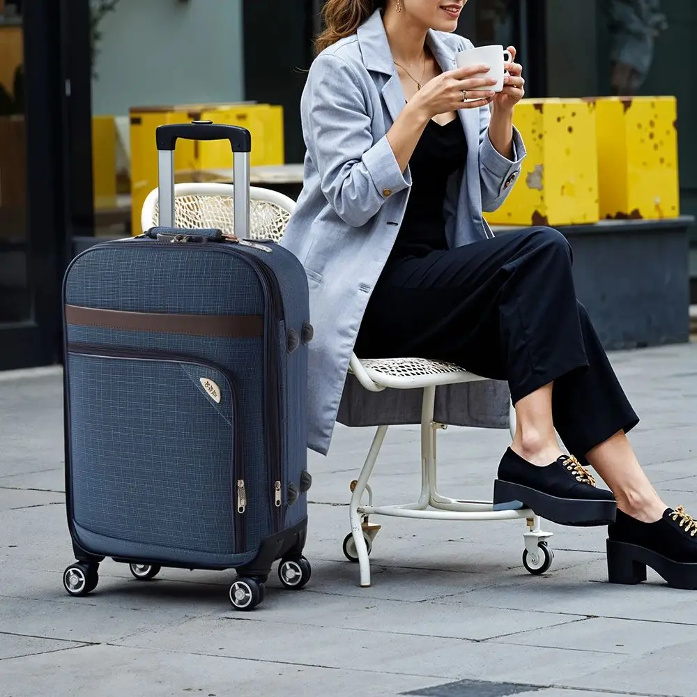 Modishion 20-inch soft shell Oxford cloth suitcase Large capacity roller trolley case with combination lock