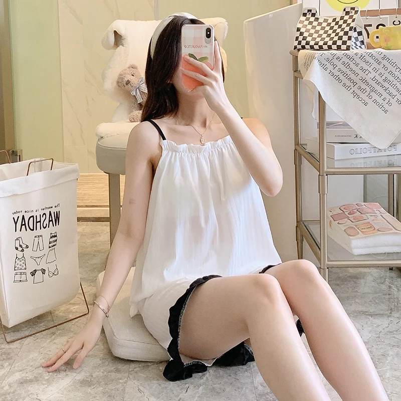Summer new thin casual sweet solid color sexy suspender with chest pad 2 sets of young girls' home clothes free delivery