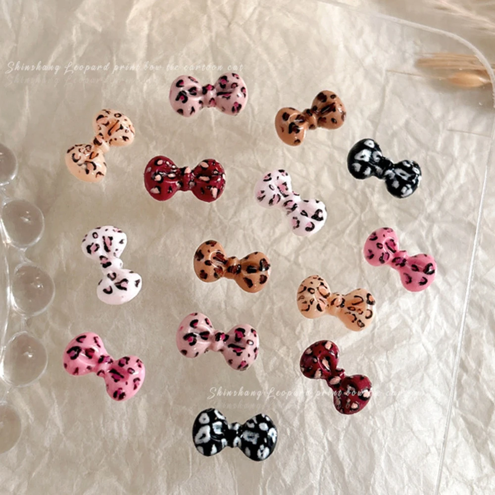 50pcs 믹스 레오파드 보우 네일 매력 매니큐어에 대 한 Bowknot 수 지 네..