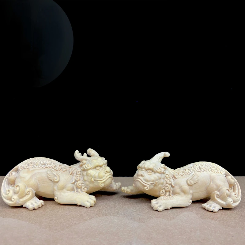 

Yueqing boxwood carving home decoration gifts male and female Kylin god beast hand piece play solid wood decoration crafts