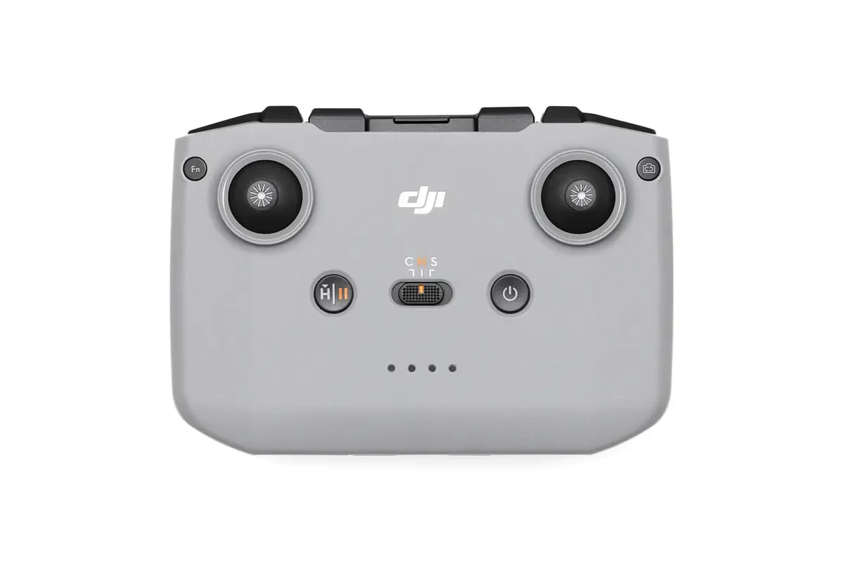 Télécommande DJI RC-N3 Original pour Drone posée sur fond clair, manette noire design ergonomique