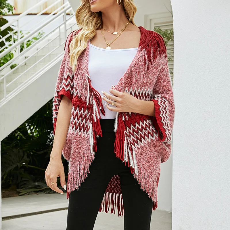 Autumn and Winter Fashion New Irregular Knitted Cloak Shawl Tassel Hem Loose Color Matching Sweater Women Ponchos and Capes