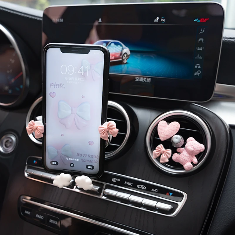 

Special anti shake silicone material for car phone holder, not damaging the air outlet, cartoon, cute, compact, and practical