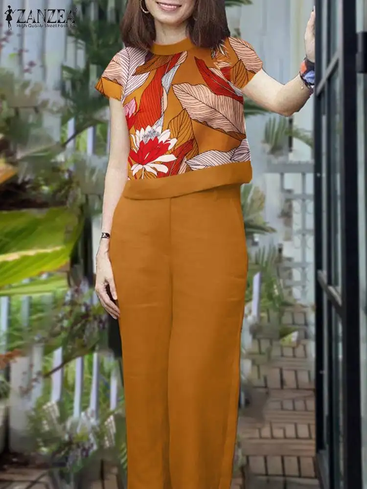 

Комплект женский летний из блузки и брюк с коротким рукавом