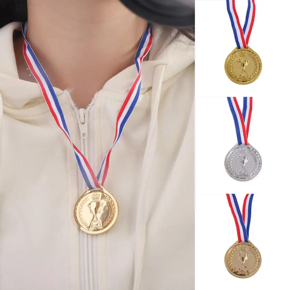 Award medals winner gold silver bronze dancing sports children running swimming plastic