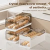 Kitchen Automatic Rolling Egg Holder 1