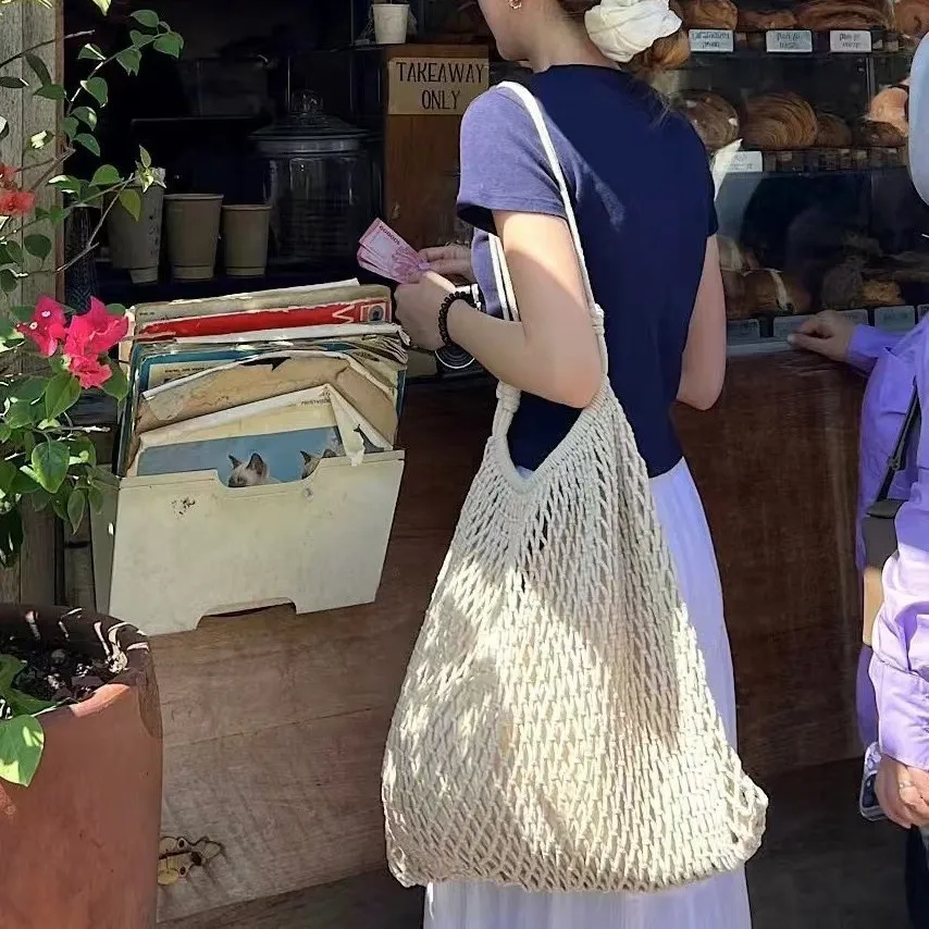 2025 New Handwoven Hollow out Beach Sandbag oulder Tote Bag Large Capaci Coastal Beach Bag Korean Sle Casual Purse