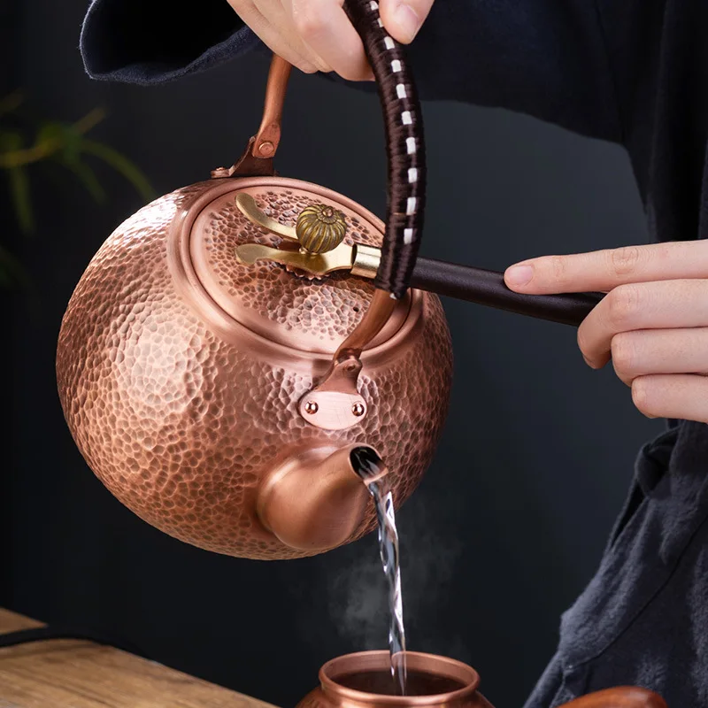 https://ae01.alicdn.com/kf/Sd25af41d1dac4b668a33bddd9b8ff83ek/Copper-Teapot-Handmade-Thickened-Tea-Pot-Set-Household-Big-Beam-Pot-Antique-Copper-Pot-Tea-Kettle.jpg
