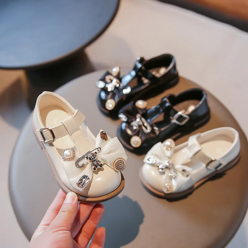 

Spring Autumn Girls Dress Children's Leatehr Shoes 2023 New Fashion Rhinestone Bow Metal Kids Flats T-shape Baby Casual Footwear