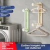 retractable clothes hanger multipurpose wall-mounted storage holder space saving with expandable Rod Clothing Hanger and Hooks 4
