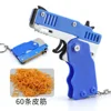 1PC Mini Keychain Gun Rubber Band Gun Toy Gun Shooting Pistol Alloy Kid Outdoor Activities Party Game Birthday Gift for Children 5