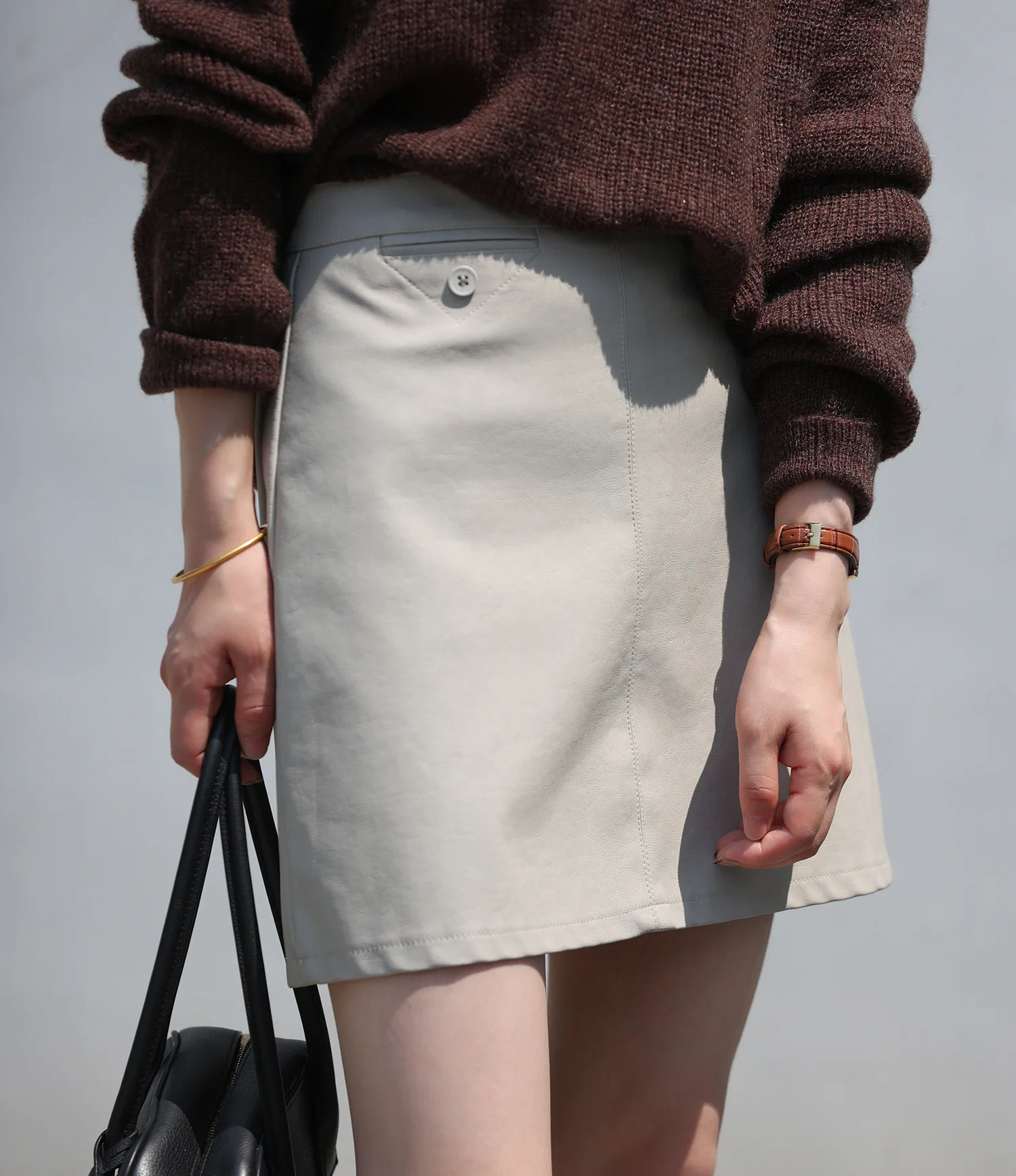 Matte PU leather short skirt for women 2022 Spring New Korean high waist show thin temperament short skirt white tennis skirt