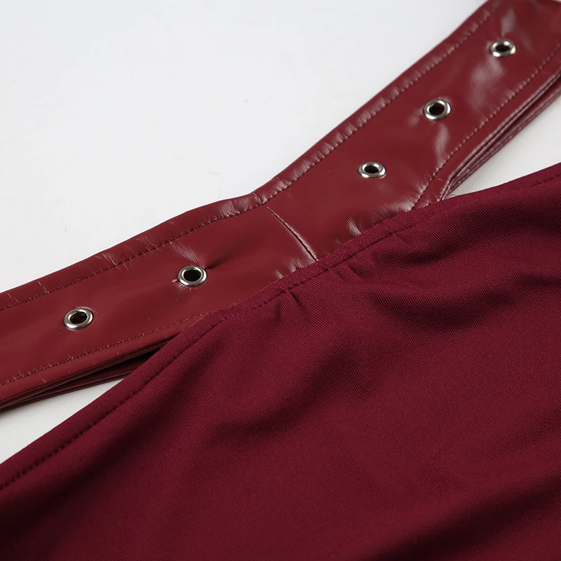 Faldas fruncidas de cuero sólido con cinturón de PU y metal empalmado para mujer, diseño irregular, minifaldas navideñas, sexys y sólidas, Gyaru