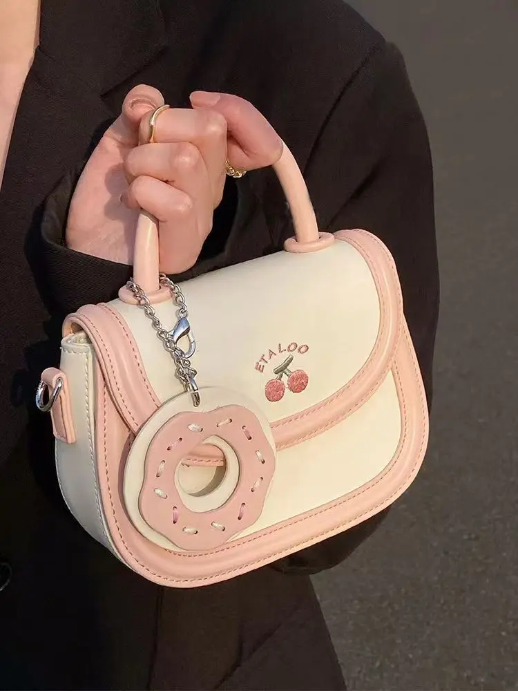 

Трендовая нишевая дизайнерская японская Сумка-седло с милым пончиком, модная простая сумка, популярная сумка через плечо, мини-сумка для мобильного телефона