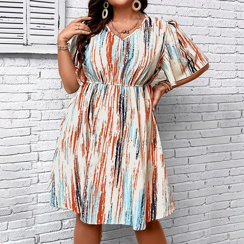 Image of Plus Size Dress, Printed V-Neck Short-Sleeved Loose Fit, Elastic Waist, Casual Style Dress.  1X-5X