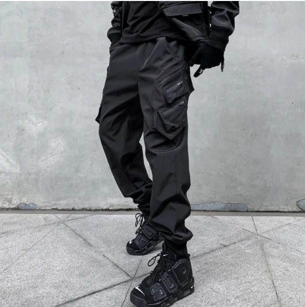Autumn and winter men's pure black multi-pocket cargo pants trend loose bunched feet casual pants  size 3XL 4