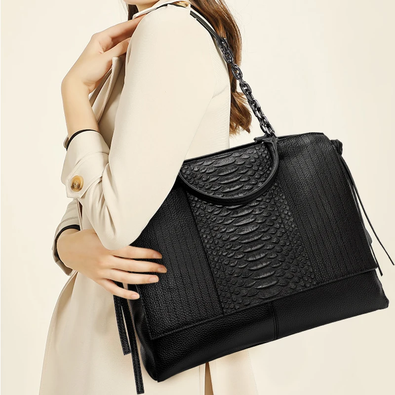 Aidrani  Elegant and minimalist women's handbag made of high-quality cowhide with tassels and ribbons main image 0