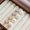 Boucles d'oreilles pendantes en perles de cristal pour femmes, accessoires d'oreille exquis, bijoux de fête, document en or, brillant, luxe, mode 2025