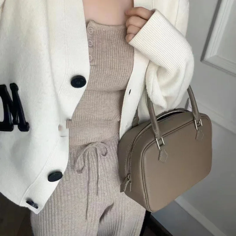 2024 New Head Layer Cowhide Pillow Handbag Women's Simple Light Luxury Large Capacity Commuter Hand Bill Shoulder Cross Body