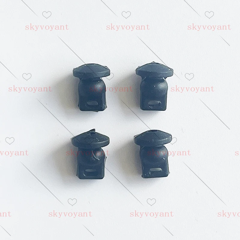 Gros plan sur un amortisseur cardan caoutchouc pour DJI Mini 5 Pro, texture et élastomère visibles.