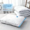 A set of multi size space saving vacuum storage bags with hand pumps - used for storing and organizing clothes and quilts 3