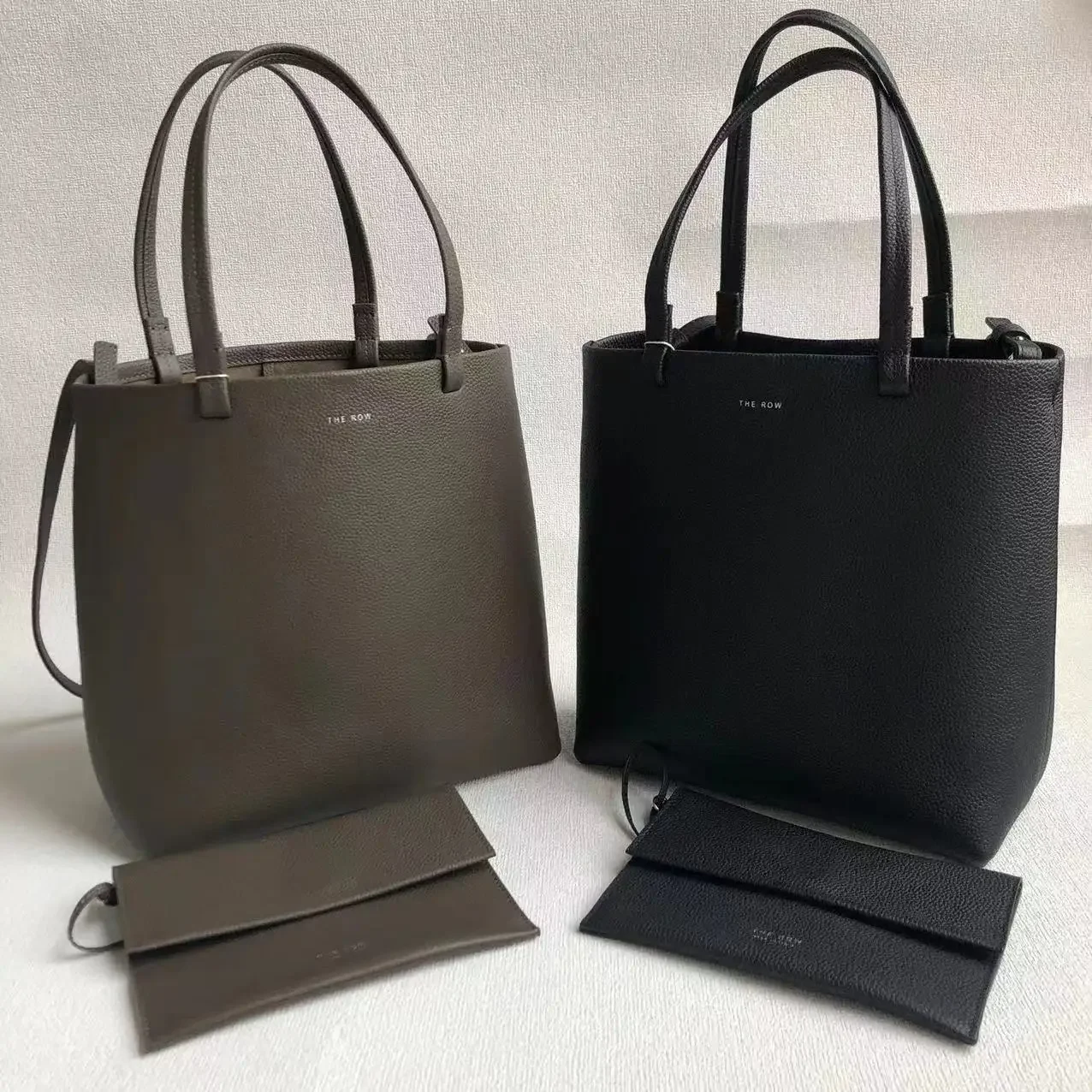 

ZHE ROW Men's and women's identical cowhide single shoulder cross-body portable bucket bag Tote steamed stuffed bun female bag