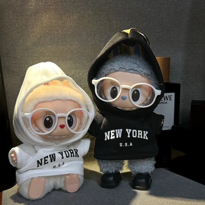 Stylish New York-Inspired Hoodie and Jeans Outfit with Glasses
