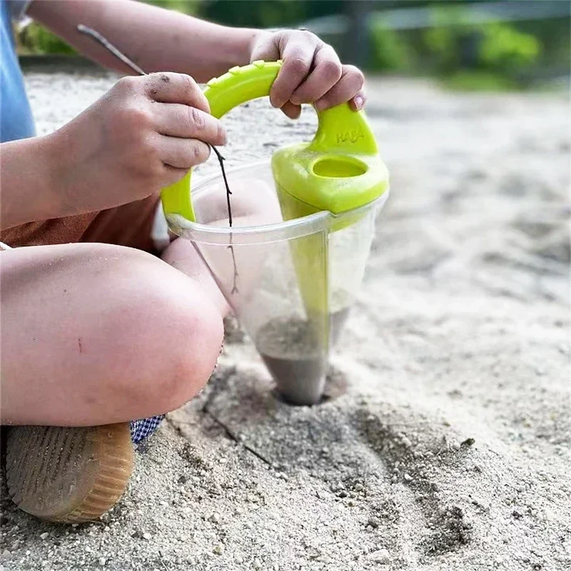 Beach Children Wash Sand Overflow Funnel Outdoor Family Sand Hopper Creative Beach Pile Sand Spills Out Of A Hand-Held Funnel