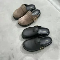 Femmes tout en peau de vache polyvalente en cuir demi-glisser confortable sans lacet fond en liège vêtements chauds sac décontracté tête mode Mules sabots 2