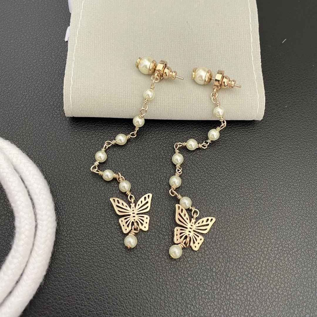 

New hollow bow pearl long earrings