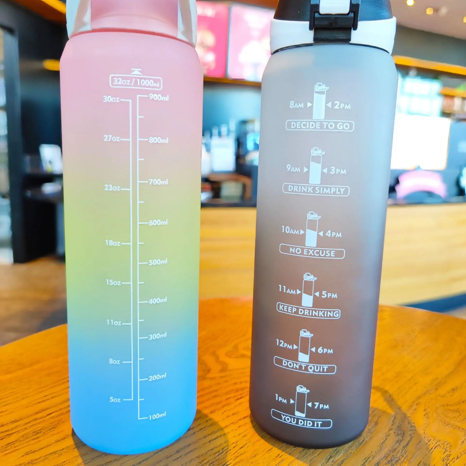 https://ae01.alicdn.com/kf/Sd32f8554f06243259f657b19c37cdb13e/1000ML-Water-Bottle-Portable-Colorful-Sports-Bottle-with-Time-Leak-proof-Cups-for-Outdoor-Fitness-Gym.jpg