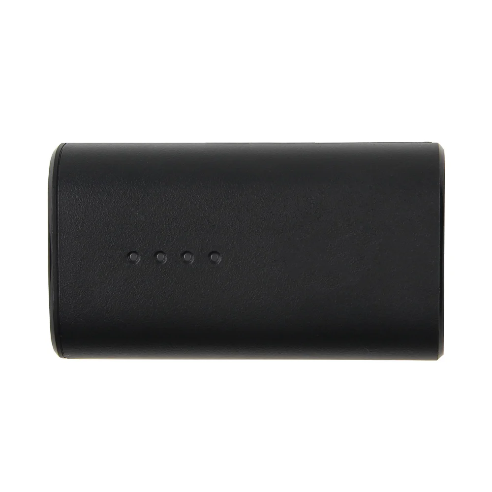 Batterie 2500mAh pour DJI FPV Goggles V2 posée à côté des lunettes, illustrant la compatibilité et l'autonomie améliorée.