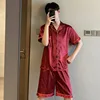 Couleur unie vêtements de nuit soie Satin Pyjamas Couple ensemble à manches courtes Pyjamas costume Pijama femmes hommes vêtements de détente grande taille Pj ensemble