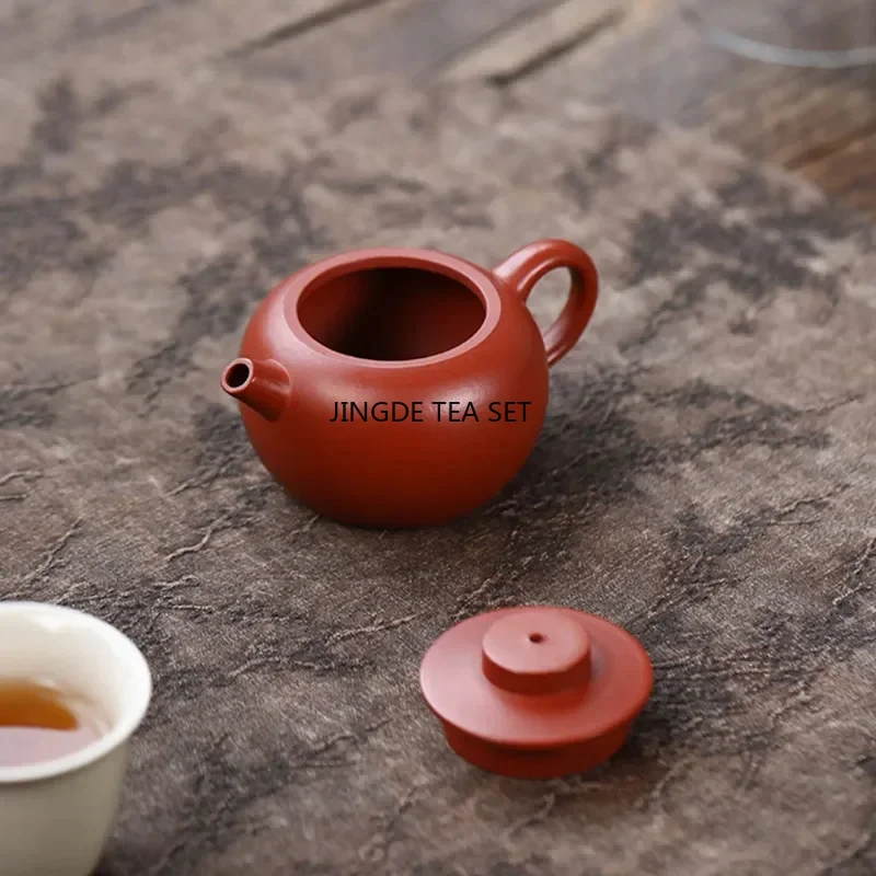 90ml Yixing Yixing purple clay teapot small capacity original ore red clay handmade Kung Fu tea set