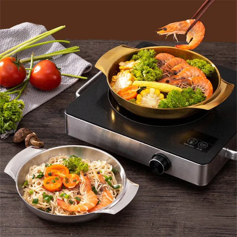 Die Cast Aluminum Round Flat Paella Pan Hole Induction Seafood Pan with  Double Handles - China Paella Pan and Seafood Paella price