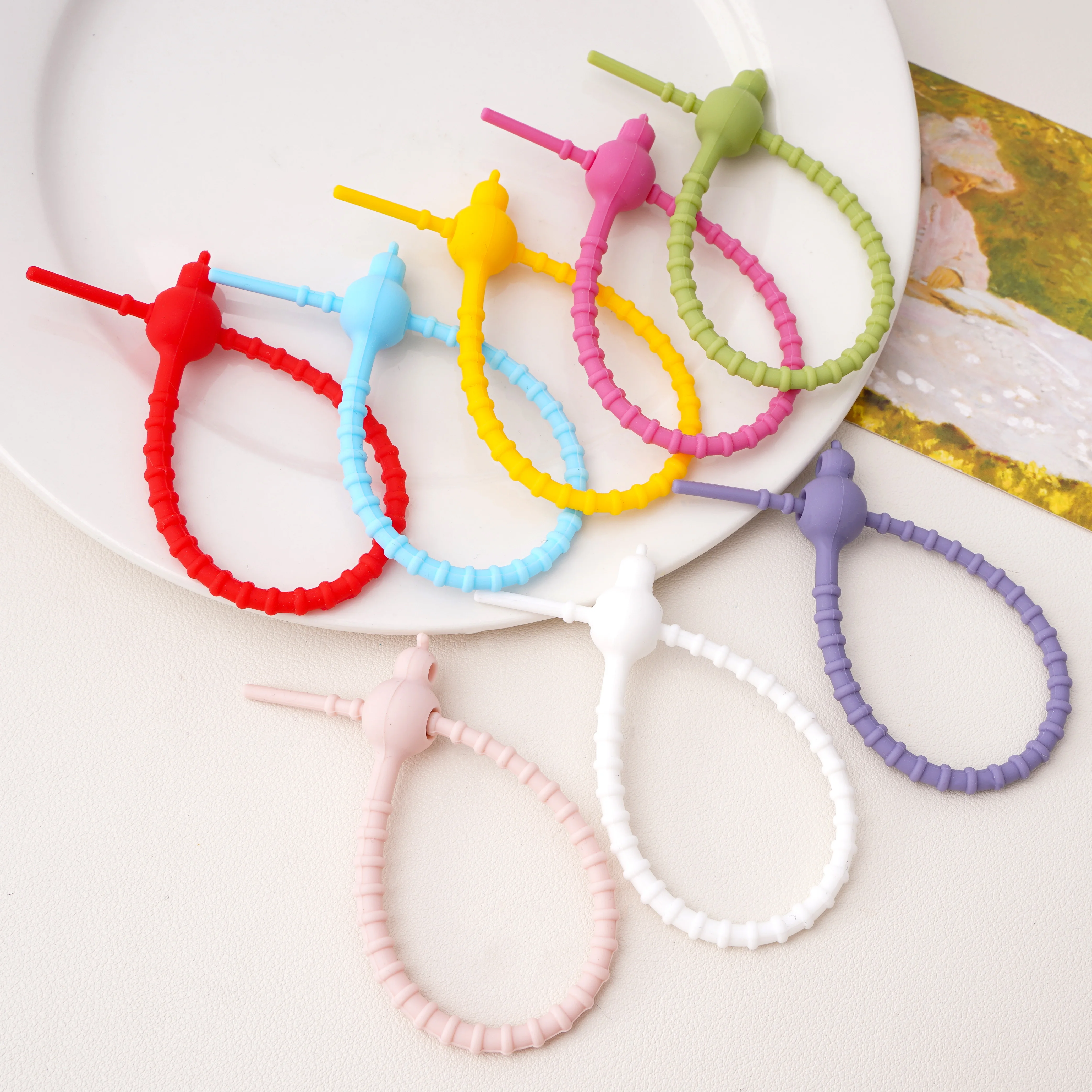 2/5 Stück Kaulquappenförmiger Kabelaufwicklung Silikonband DIY Schlüsselanhänger Anhänger für Kopfhörer Ladekabel Linie Binder Riemen Organizer