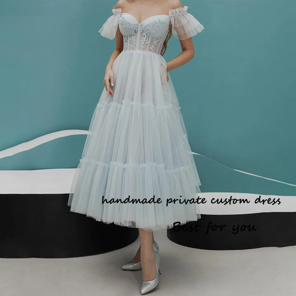 Светло-голубые тюлевые платья для выпускного вечера