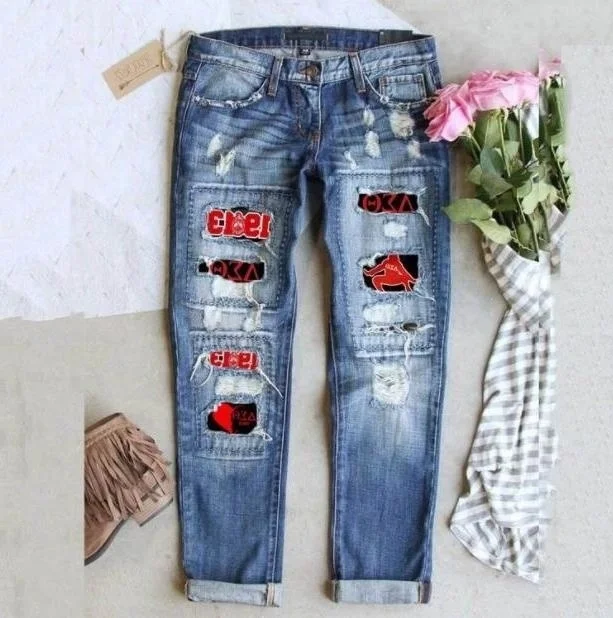 

Direct Deat Cross-Border European and American Greek Sorority Middle Waist Printed Sticker Hole Washed Jeans for Women 2024 new