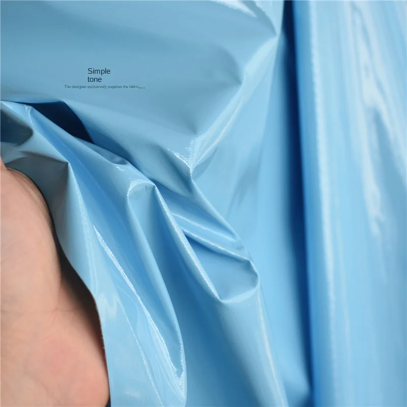Stretch PVC Mirror Leather Cloth Coated Patent Leather Light Blue Fabric Soft Waterproof Designer Diy Sew Down Clothing Fabrics