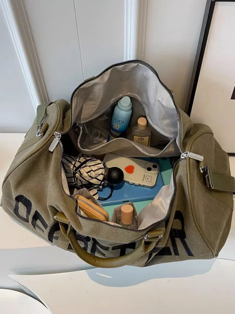 Canvas Traveling Bag Large Capacity Crossbody Gym Bag Women's High Sense  Men's Handbag Sports