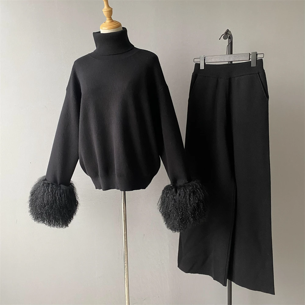 Women wearing loose fit turtleneck knit set