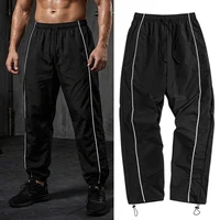Pantalon de sport tendance pour hommes avec lignes, pantalon de course, d'entraînement, de gymnastique, avec poches latérales, pantalon de survêtement athlétique respirant à séchage rapide 1
