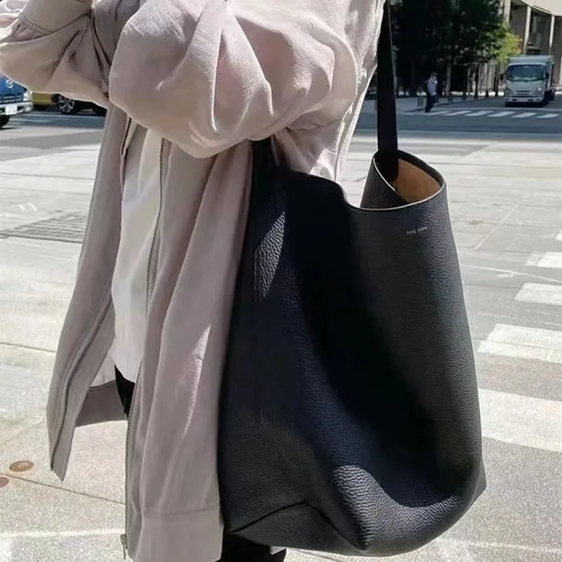 

The R Head Layer Cowhide Autumn and Winter Small Crowd Large Capacity Commuter Tote Bag Women's One Shoulder Portable Bucket Bag