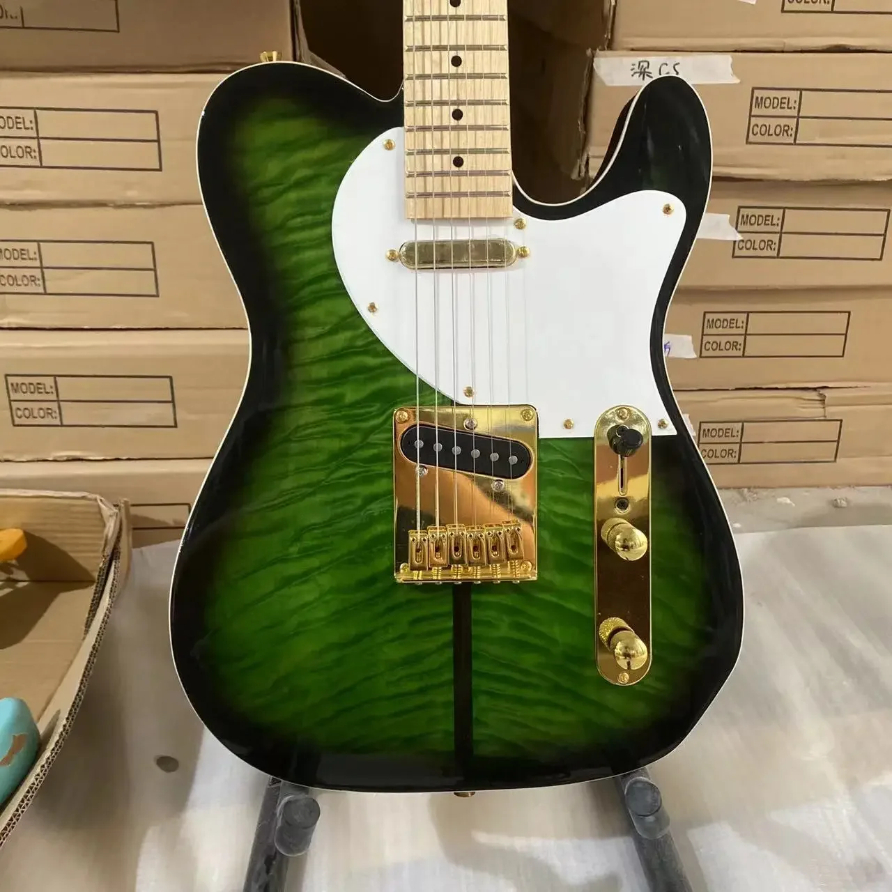 

Tele Electric Guitar, Merle Haggard Signature, Tuff Dog, Green Burst Color, Cloud Maple Top, Golden Hardware, Free Ship violão