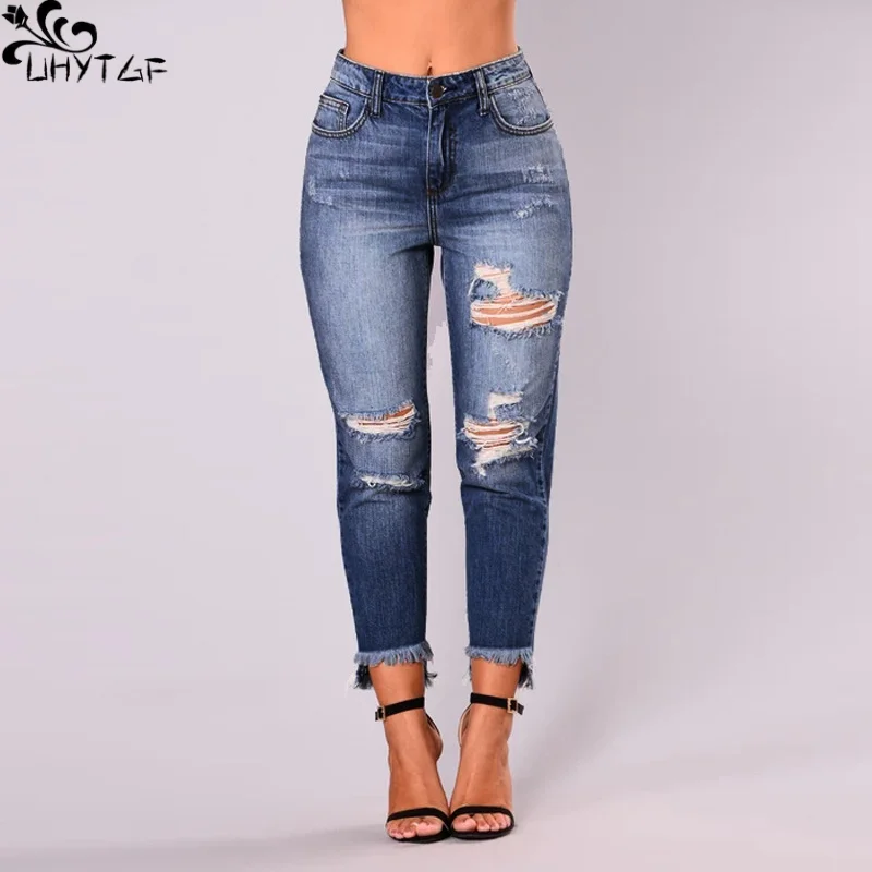 

Рваные джинсы UHYTGF для женщин, осенняя мода, с высокой талией, с дырками, нестандартные, с необработанными краями, трендовая уличная одежда, женские джинсовые брюки