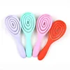 Manufacturers direct hollow back comb oval comb circular bead head non-skin curved row comb household multi-functional hair comb 4