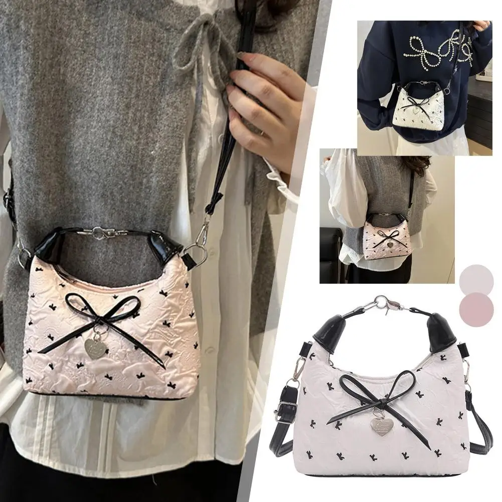 Bow Crossbody bag for women Sweet Fashion Print Metal heart Pendant Hand-held Single shoulder bag Commute Handbag Underarm pouch