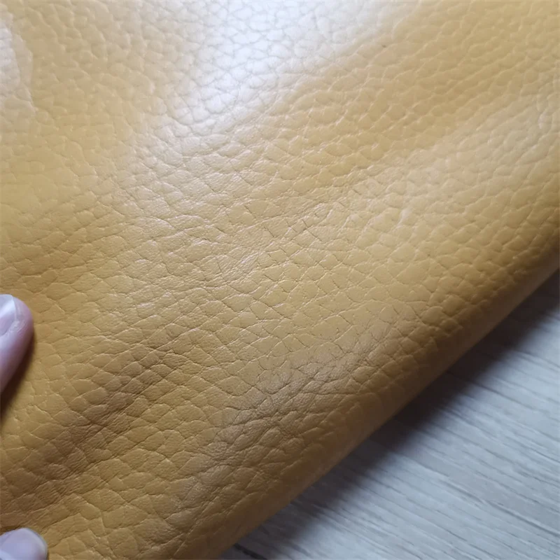 Description Picture 2 of item1.5mm Yellow Brown Cowhide. The First Layer Of Cowhide.Genuine leather Fabricr. Handmade DIY Bag. Shoes. Sofa Repair.