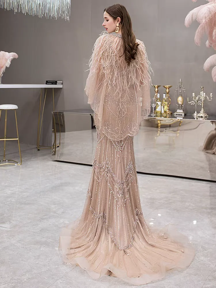 فستان سهرة مطرز بالخرز الوردي، فستان صفارة الإنذار...