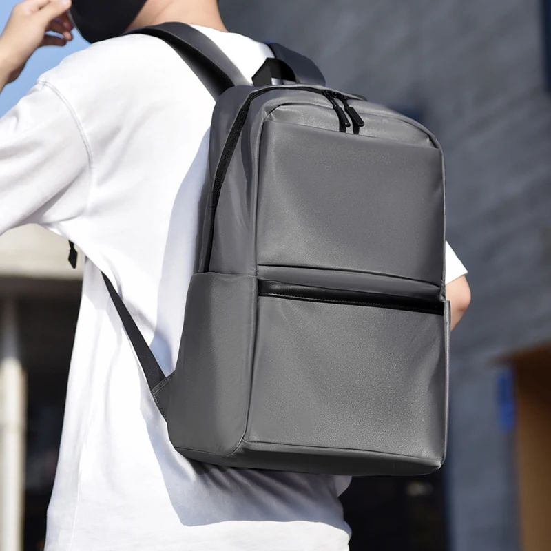 Men's large capacity laptop backpack with adjustable shoulder straps, durable for travel and school